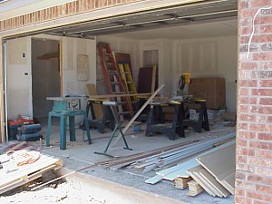 The garage is transformed into a temporary workshop.